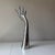 Vintage cast aluminum chrome hand sculpture. This piece is quite interesting given its fluid details and quite sizable. It...