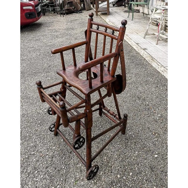 Stage chair as a child who can with his particular joints becomes a folding swivel stroller. Made of solid wood Italy era...