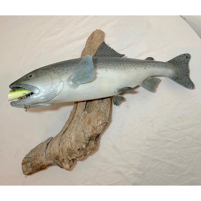 This vintage handmade sculpture by EG features a beautifully sculpted fish mount, perfect for any art lover or fishing...