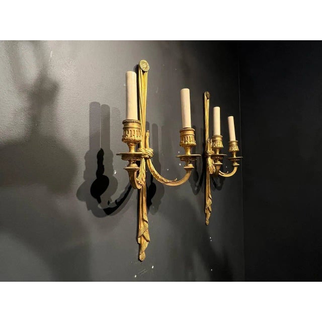 A pair of circa 1930’s Caldwell double light sconces original finish