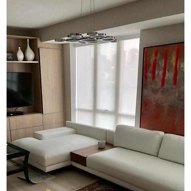11 circles of varying size displays light beautifully. The light fixture is all chrome with white around where the light...