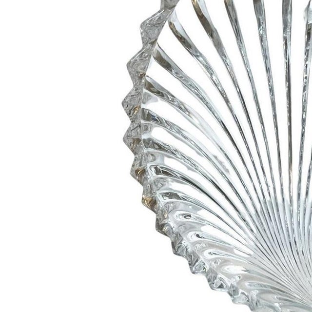 A round scalloped crystal glass trinket dish by Villeroy & Boch. This heavy piece will be lovely on a side table,...
