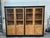 This large oak display cabinet has been completely restored. It consists of a black patinated body and doors and shelves...