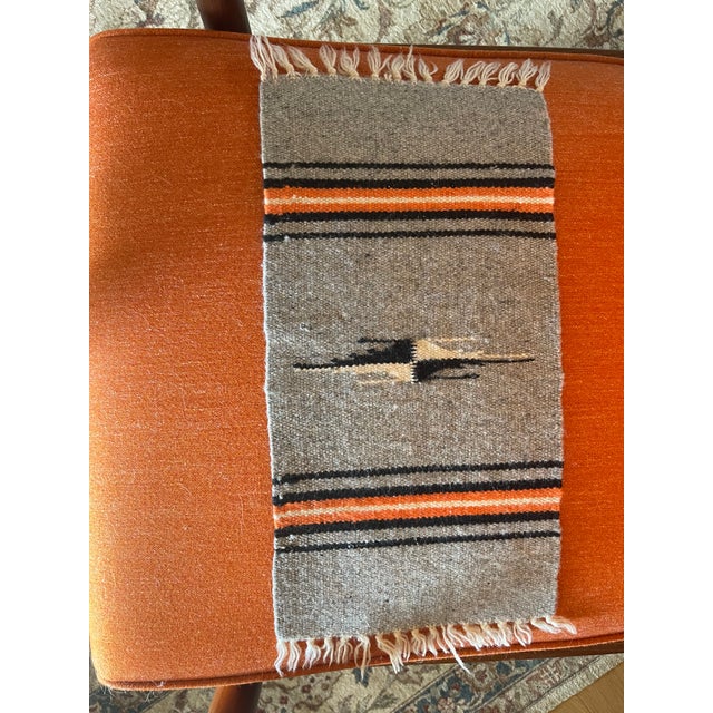 Vintage New Mexican wool Chimayo tapete weaving, gray black,and whitee central image, black, orange stripes. Color and...