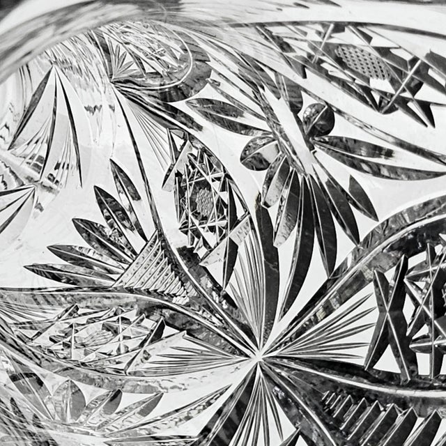 This beautifully hand cut vase is a superb example of mastery in workmanship. It is ornate and extremely well cut. Cut...