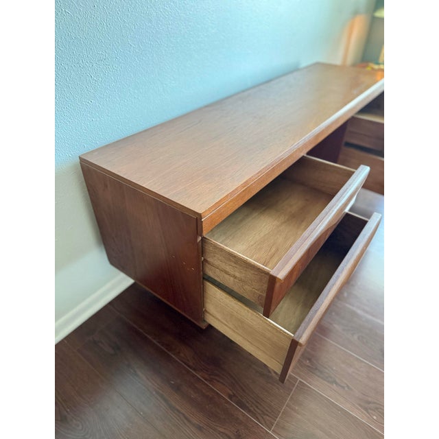 A classic mid-century modern vanity / desk by Austinsuite, circa 1960s. Founded in London by Herschel Lewis Austin and his...