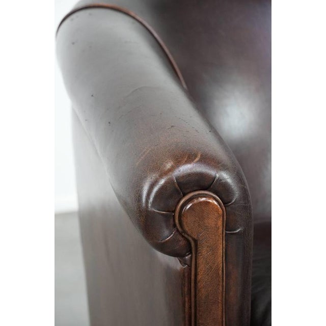 Stylish and Characterful Dark Brown Vintage Club Armchair in English Style Made of Sheepskin with Matching Piping For Sale - Image 10 of 16