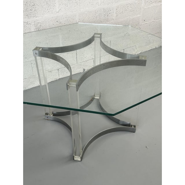 Designer dining room table by Alessandro Albrizzi in glass, chrome metal and acrylic glass. Italy circa 1970 Width: 130 cm...