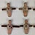 A set of 10 salvaged football soccer players made of metal with what seems to be brass bar that connected them. These came...
