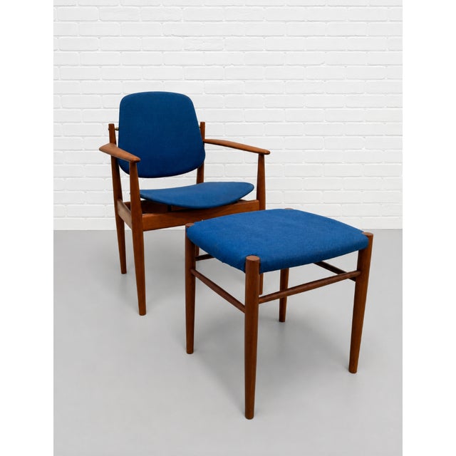 An exceptional and hard-to-find Mid Century Modern Model 203 armchair designed by Arne Vodder for France & Daverkosen and...