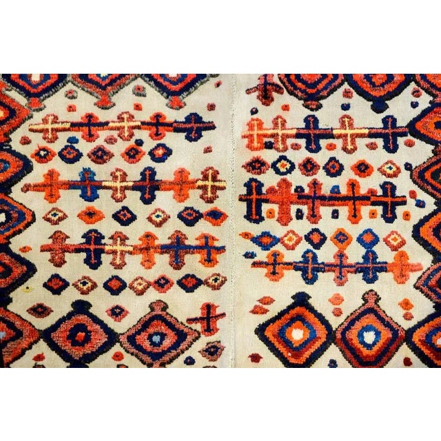 An amazing mid-20th century Persian Afshar horse blanket with a beautiful whimsical pattern of multicolored crosses and...