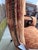 A handsome pair of Queen Anne style armchairs featuring gracefully curved mahogany-finished frames, scrolling arms,...