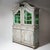 Solid oak display cabinet with a two-door glazed upper section and a two-door lower cupboard. The shaped crest, molded...