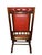 English platform rocking chair upholstered in deep button-tufted oxblood leather in the Chesterfield tradition. Solid...