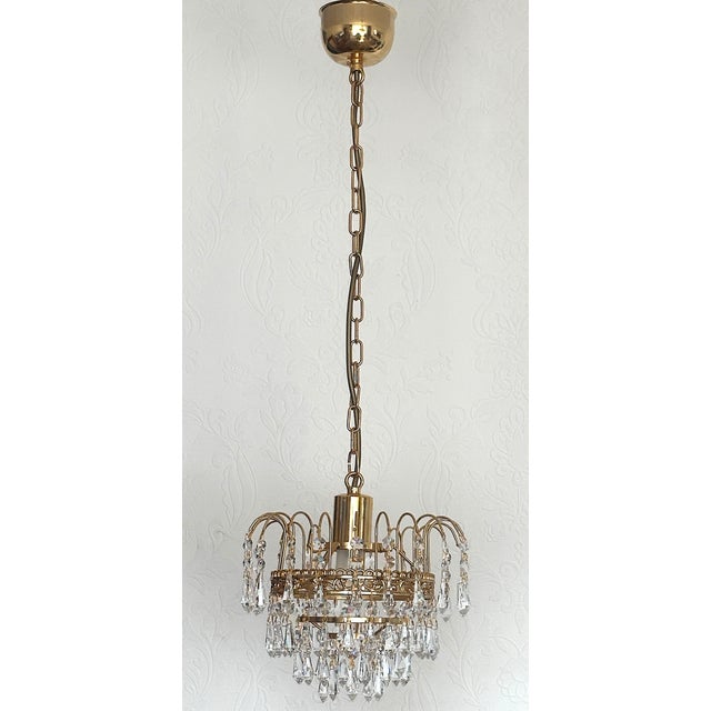 Brass and Lead Crystal Chandelier by Joska Bodenmais, 1970s, in Very Good conditions. Designed 1970 to 1979 I have...