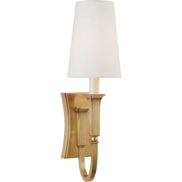 Delphia Small Single Sconce in Hand-Rubbed Antique Brass with Linen Shade Designer: Thomas O'Brien Height: 17.25"...