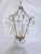 Vintage French chandelier with brass frame and dressed with hand cut natural rock crystals. It has one candelabra base...