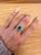 This beautiful ring features a 1.84 carat Colombian Emerald gemstone with milgrain details and natural earth mined...