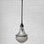 A Luzette pendant lamp, often attributed to the German architect Peter Behrens. The model was originally developed for...