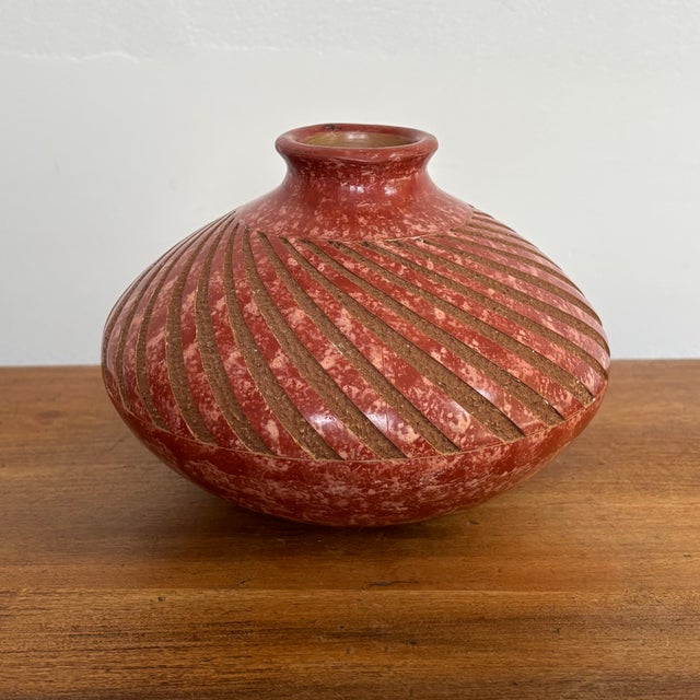 Nicaraguan Folk Art pottery vase from the region of San Juan de Oriente, known for its hand-thrown red pottery with etched...