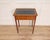 This elegant Louis XVI–style side table is crafted in cherry wood and features refined, classical proportions...