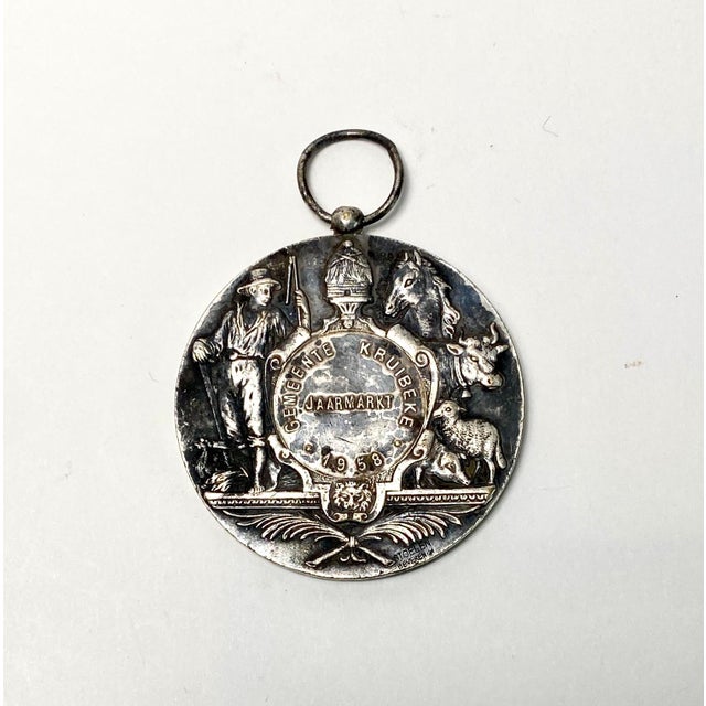 These agricultural medals are wonderful windows into the farming and pastoral history in this case, Belgium. This silver-...