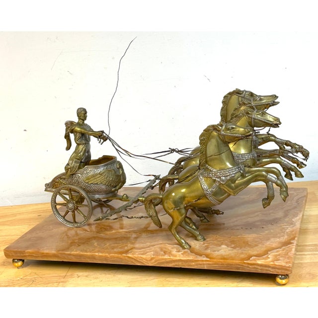 Monumental Grand Tour Imperial Roman Triumphator Driving a Four-Horse Quadriga A monumental and visually commanding Grand...