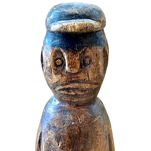 Really well done, cool hand-carved man. I thought this rather tall figure was a piece of American folk art. I am now told...