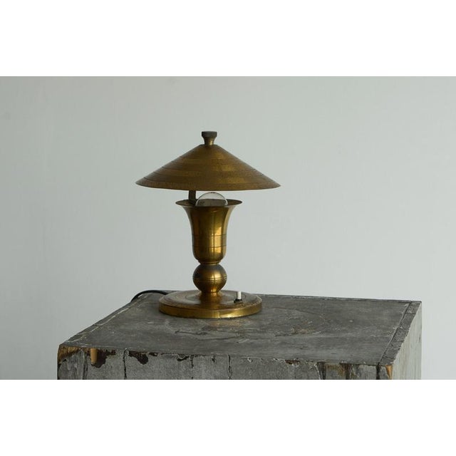 Art Deco Accent Table Lamp in Patinated Brass, Europe, 1940s. A small but very nice art deco table lamp in nicely...
