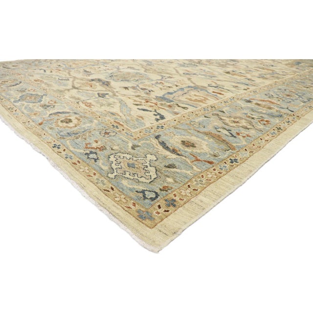 60898 Persian Sultanabad Rug, 10'04 x 14'00. This hand-knotted wool Persian Sultanabad rug features an all-over botanical...