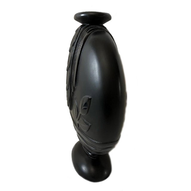 This beautiful accent piece is made of resin weighs around 7lbs. Matte finish with a raised gloss design both sides are...