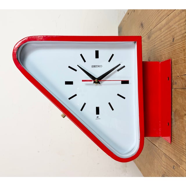 Vintage Industrial triangle maritime wall clock made by SEIKO in Japan during the 1970s. These clocks were used on large...