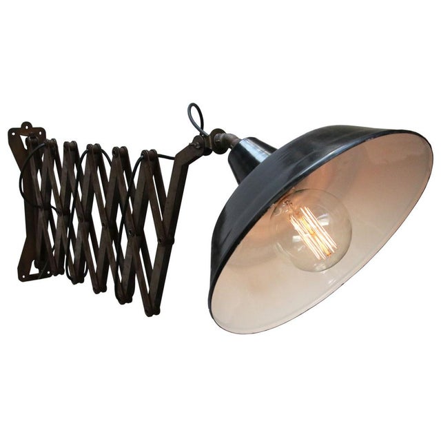 Extra large wall scissor light. black enamel, white interior adjustable length and swivelling arm Shade size: diam. 40 cm...