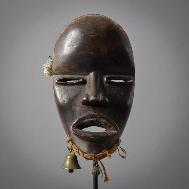 Dan masks, originating from the Dan people of Liberia, CÃ´te d'Ivoire, and Guinea, are recognized for their elongated...