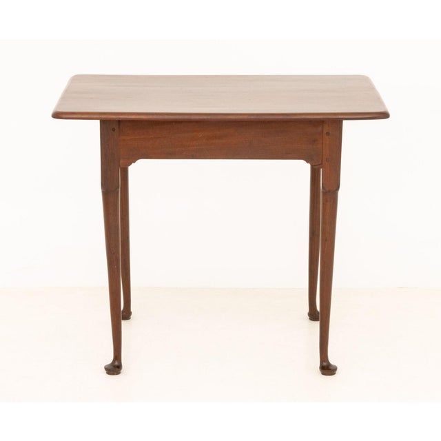 Queen Anne Style Mahogany Tea Table, 19th century, paper label to underside. 27.25" H x 32.5" W x 23" D. Provenance: From...