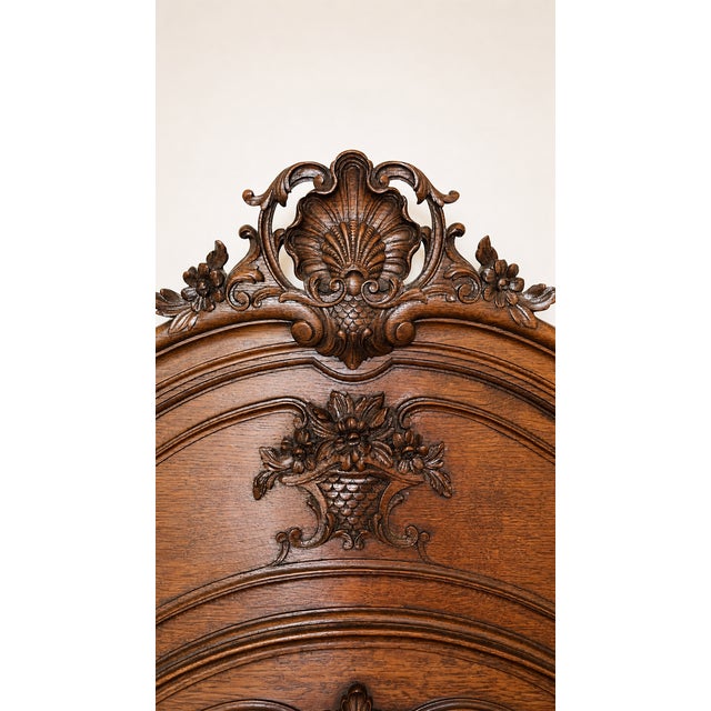 Large solid oak fireplace mirror with beautiful proportions. The oak frame is in excellent condition. There are a few age-...