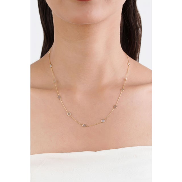 This By-the-Yard station necklace featuring 1 carat of uneven shapes natural diamonds, set in 14k yellow gold. Each...