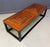 Handsome mid-century modern coffee table by Founders, featuring a richly grained walnut veneer top with striking geometric...