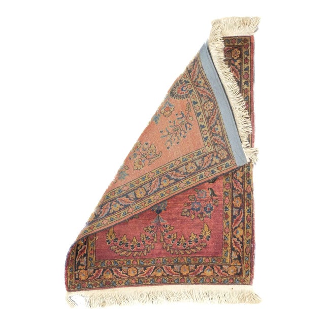 The well-woven village carpets from the Arak/Sultanabad area, especially the red field/navy border, detached floral spray...