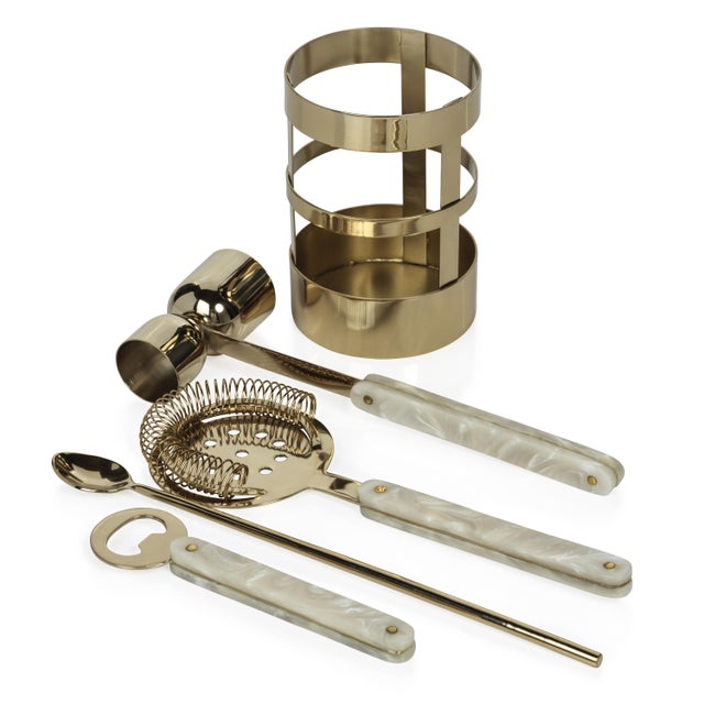 Elevate your home bar with this stylish and functional 5 Piece Bar Set in gold. The set includes all the essential tools...