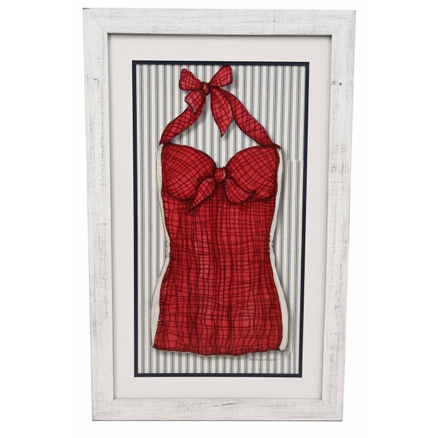 Charming set of four matching framed prints featuring whimsical, retro bathing suit illustrations in a soft coastal...