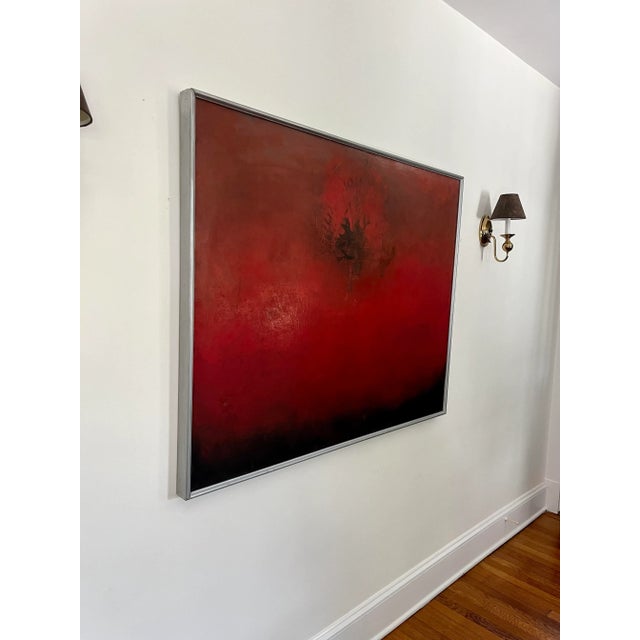 Striking, dramatic and moody oil painting on canvas and wood frame. Deep red with shades of black. Light abstract texture...