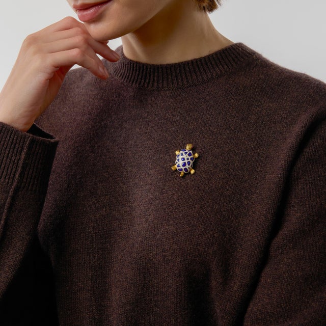 This delightful vintage turtle brooch by Tiffany & Co. captures the brand’s playful yet refined approach to design....