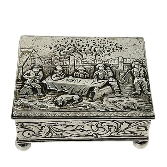 Silver Box by Simon Rosenau with a scene of 5 men drinking in the 17th Century Richly decorated silver box, interior...