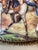 A pair of porcelain plaques color transfer with hand embellishments of Napoleon on horseback in battle. Each is trimmed in...
