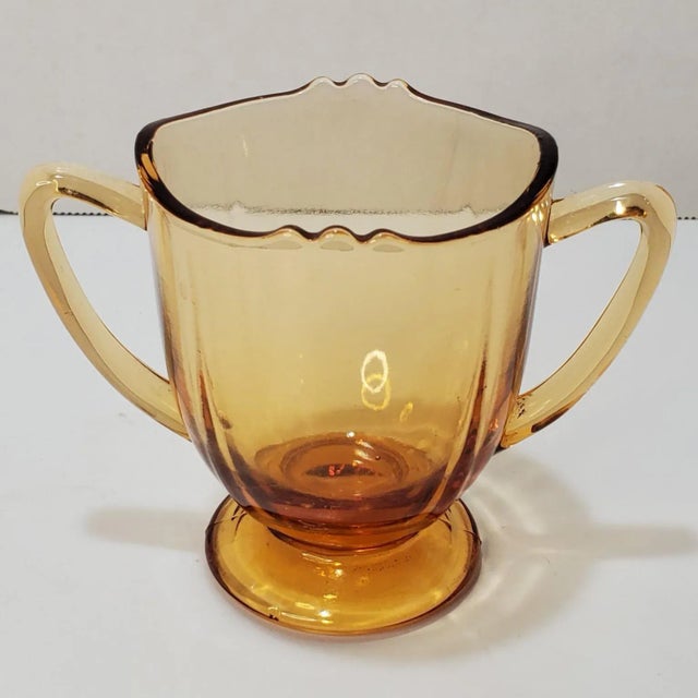 Pattern: #44 Color: Amber Company: New Martinsvillle Dates Produced: 1930s Shape: Footed Open Sugar