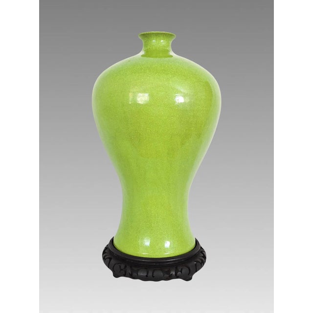 Superbly shaped lime green crackle glazed Mei Ping monochrome vase from China. This is one of the most elegant forms of...