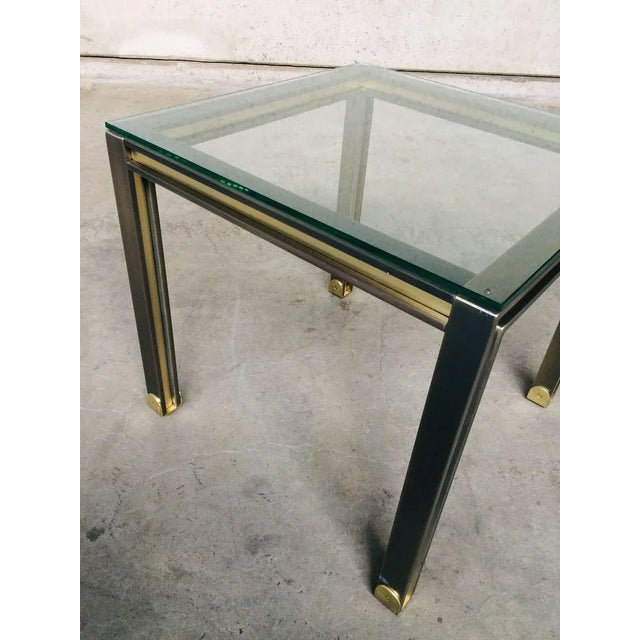 Vintage Post Modern Design brushed steel & brass square Coffee Table with clear glass top, made in Belgium, 1980's....