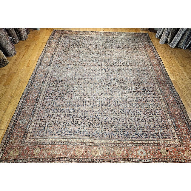"An exceptional and rare 19th century oversized Persian Farahan rug, handwoven in Western Persia circa mid-1800s. This...