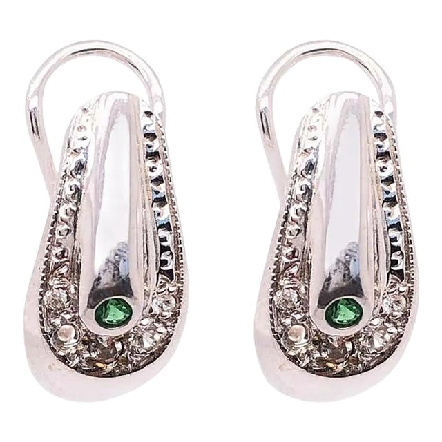 18 Karat White Gold Earrings Emerald Center With Diamond Accents French Back For Sale